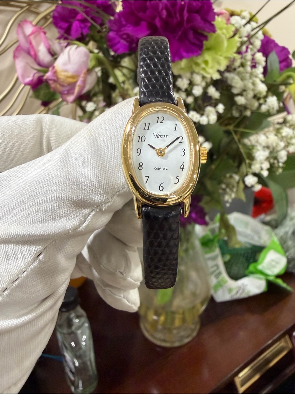 Vintage Timex Indiglo Ladies Oval Gold Tone Watch Black Leather Strap J5